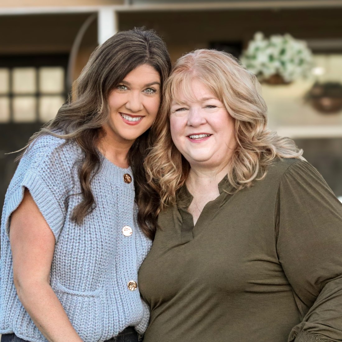 Momma and daughter smiling together